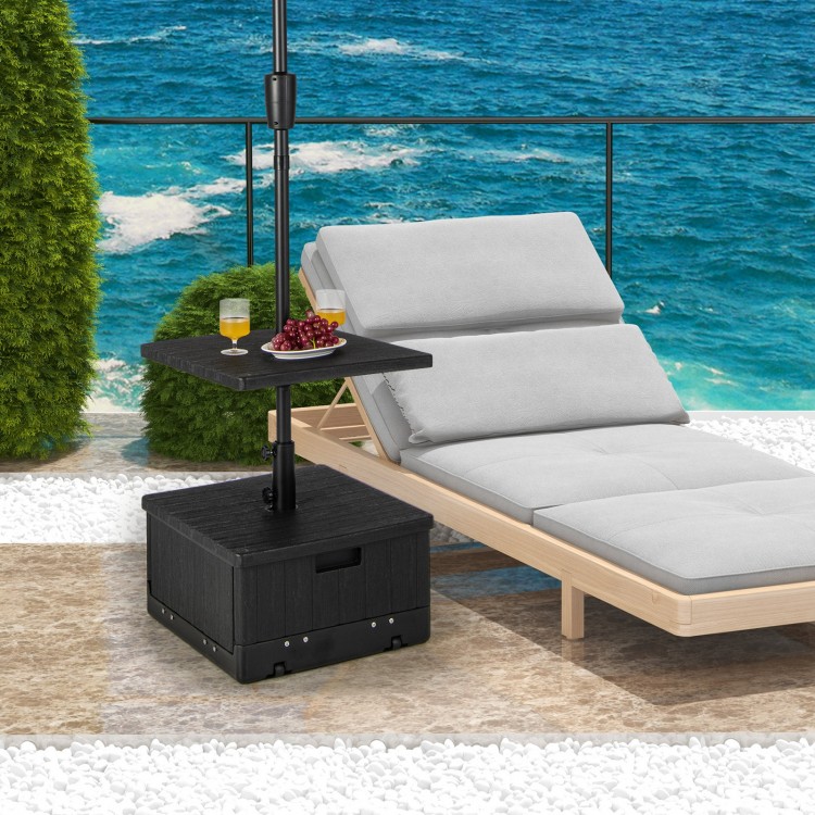 Fillable black umbrella base with table tray, designed for stability and versatility in outdoor settings.