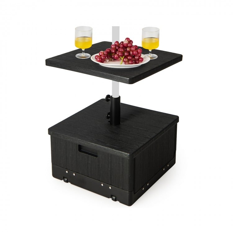Black outdoor fillable umbrella base with table tray, designed for stability and versatility in patio settings.