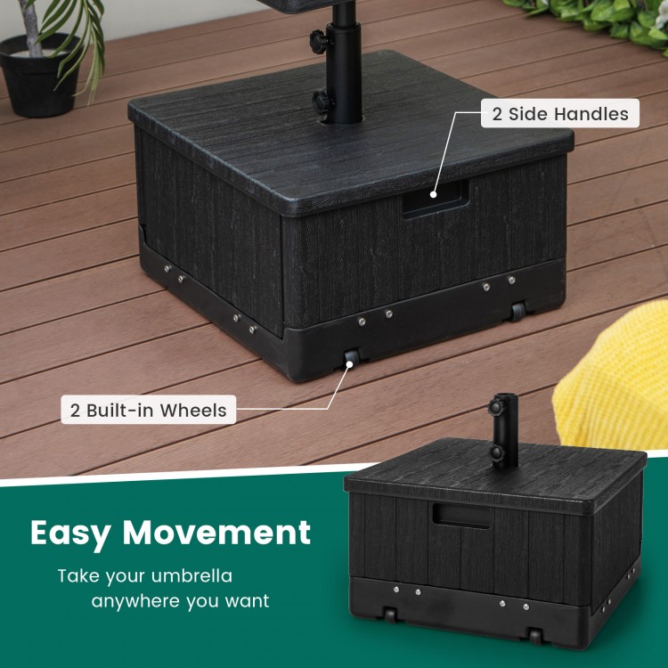 Fillable 175 lbs outdoor umbrella base in black with wheels and handles for easy movement and stability.