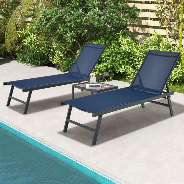 Navy 3-piece patio chaise lounge chair and table set with adjustable backrests, perfect for poolside relaxation.