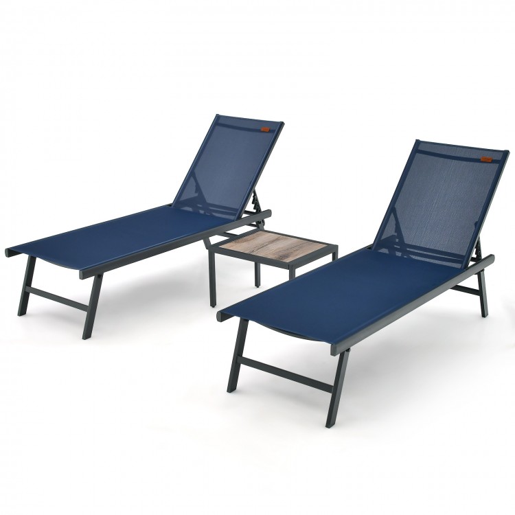 Navy 3-piece patio chaise lounge chair set with adjustable backrests and wood-like coffee table for poolside relaxation.
