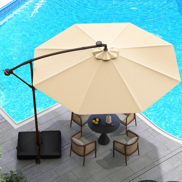 10-foot cantilever umbrella in beige with solar LED lights, featuring a sturdy base and modern design for outdoor use.