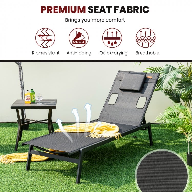 Black patio sunbathing lounge chair with adjustable backrest, headrest, and durable breathable fabric for outdoor.