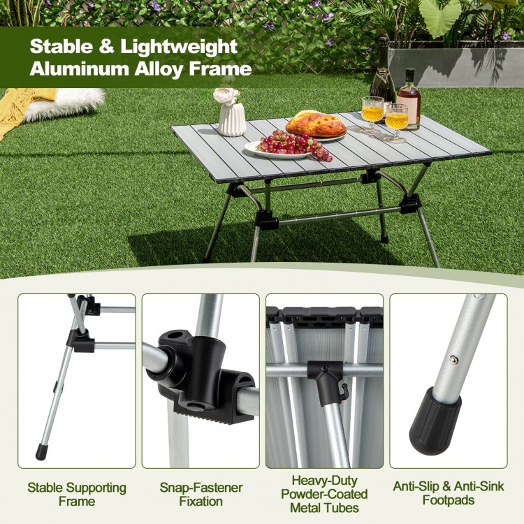 Folding heavy-duty aluminum camping table with adjustable height, anti-slip footpads, and waterproof surface for.