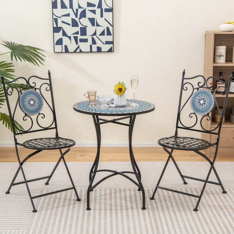 Three-piece patio bistro set featuring a mosaic pattern, with folding chairs and a stable metal frame for indoor or.