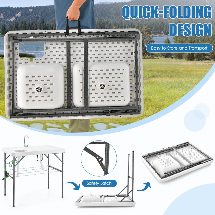 Folding fish cleaning table with double sinks, heavy-duty frame, and quick-folding design for easy transport and.