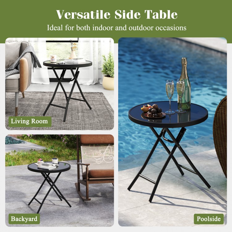 Black 18-inch folding side table with tempered glass top, ideal for indoor and outdoor use, shown by poolside.