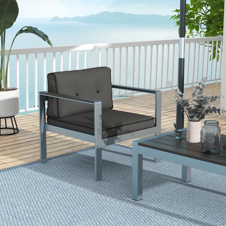 Contemporary gray sofa chair with WPC armrests and cushions, designed for comfort and modern outdoor settings.