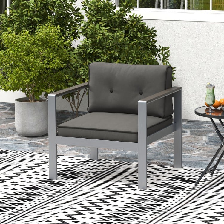 Contemporary gray sofa chair with WPC armrests and cushions, featuring a sturdy aluminum frame for outdoor comfort.