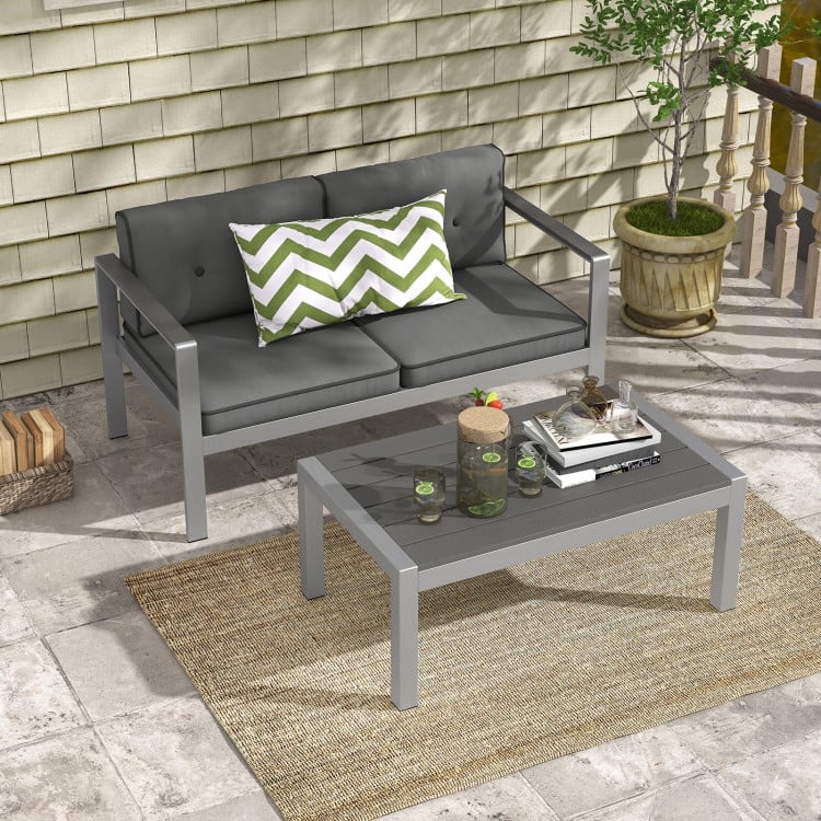 Contemporary coffee table with aluminum frame and modern design, perfect for outdoor lounging on your balcony or porch.