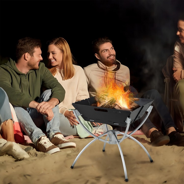 3-in-1 camping campfire grill with stainless steel construction, set up for BBQ, surrounded by friends by the fire.