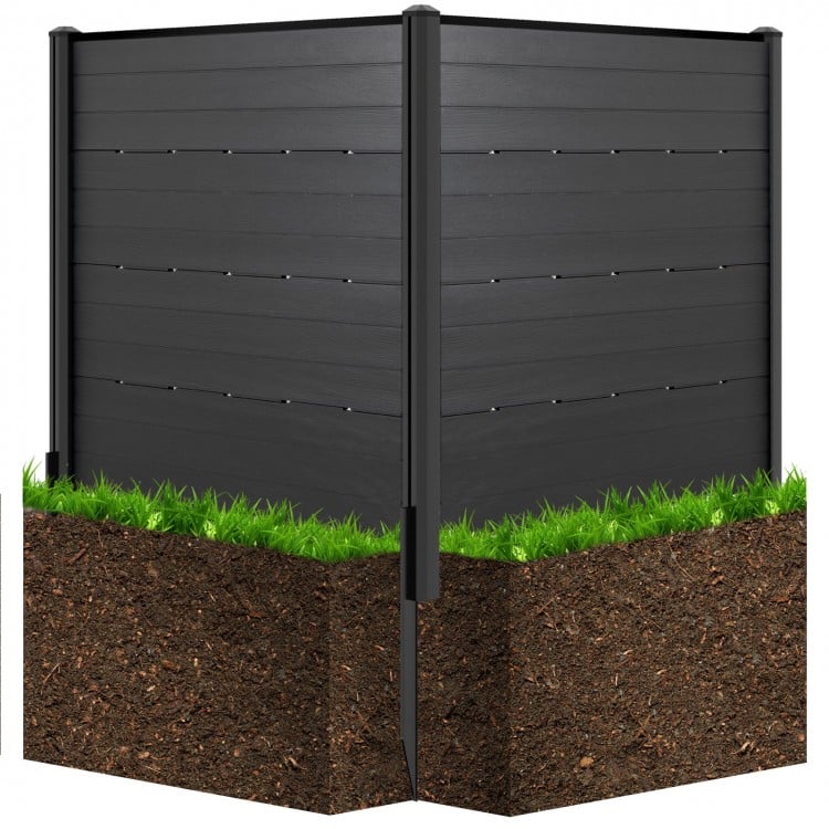 Black outdoor privacy fence screen with wood-like texture, includes 5 ground stakes for secure installation in gardens.