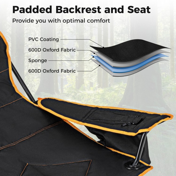 Padded backrest and seat of the black folding camping chair with adjustable footrest for optimal comfort outdoors.