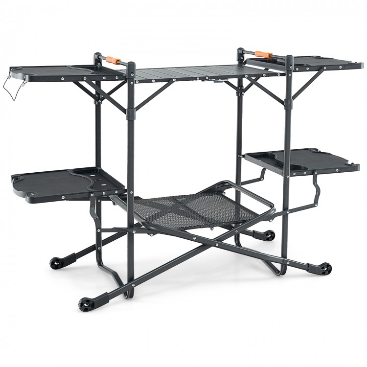 Folding portable outdoor cook station with heat-resistant aluminum tabletop and multiple storage shelves for easy food.
