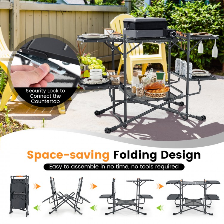 Folding portable outdoor cook station with heat-resistant aluminum tabletop, featuring side tables and built-in hooks.