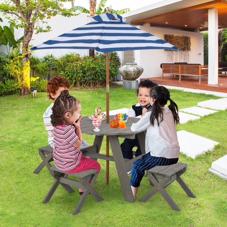 Kids wooden table set with gray finish, featuring an octagonal table, 4 stools, and a removable striped umbrella for.