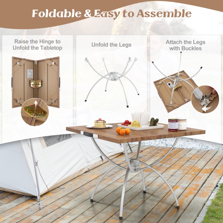 Folding camping table with wood-grain tabletop and aluminum legs, ideal for outdoor activities like picnics and BBQs.