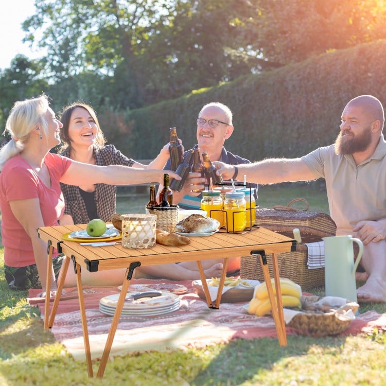 Folding camping picnic table with waterproof surface, sturdy aluminum frame, perfect for outdoor gatherings and easy.