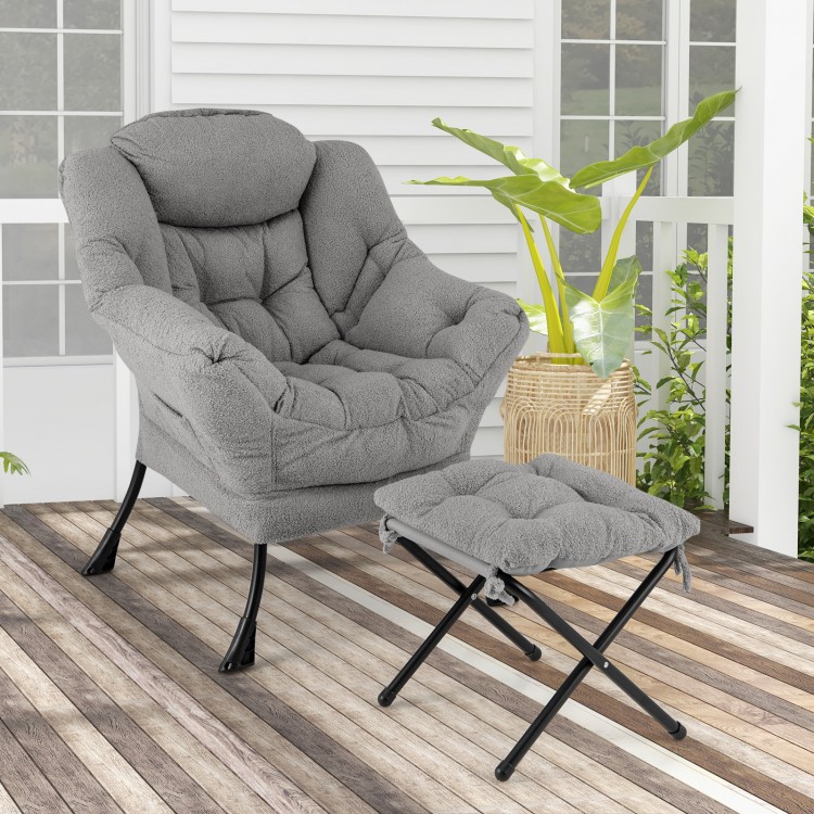 Modern accent chair in gray with a folding footrest and head pillow, perfect for living rooms and porches.