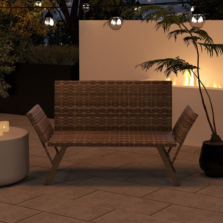 Patio convertible sofa for 2 in gray PE rattan, adjustable armrests, perfect for backyard or poolside relaxation.