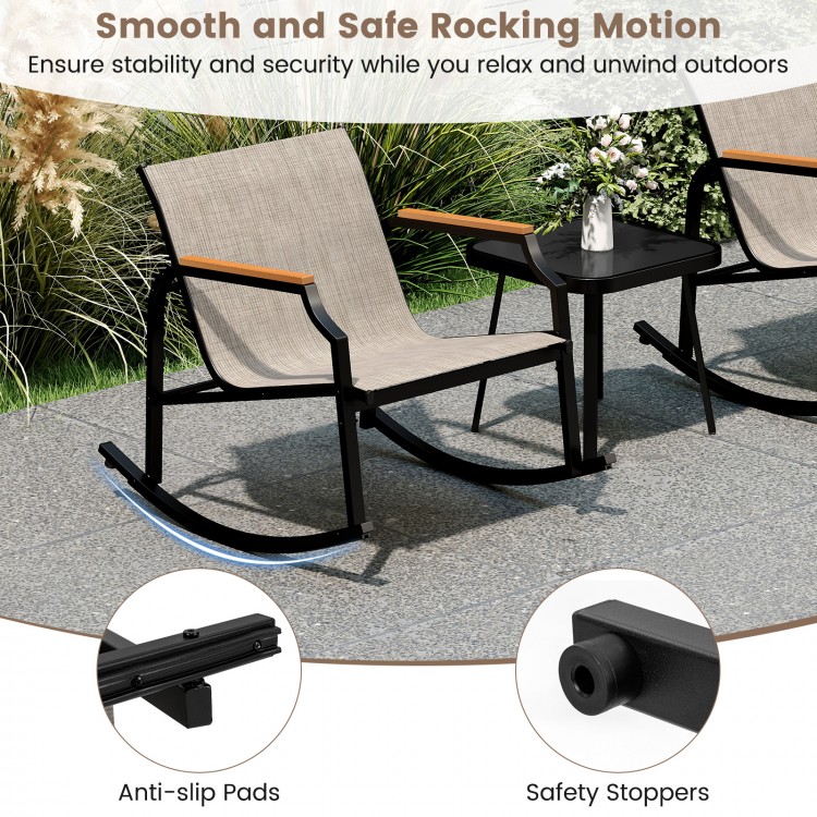 3-piece patio rocking bistro set with breathable fabric seats and tempered glass table, perfect for outdoor relaxation.