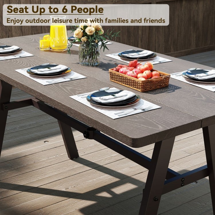 Outdoor picnic table set for 6 people with a wood-like surface, ideal for patio gatherings and leisure time.