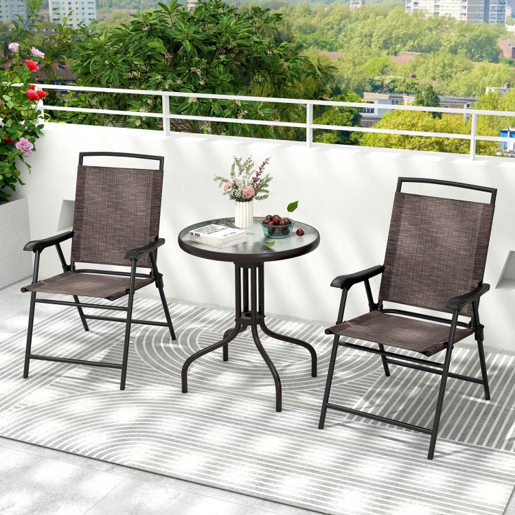 Folding patio chairs and round table set with rippled tempered glass, perfect for balconies and small outdoor spaces.