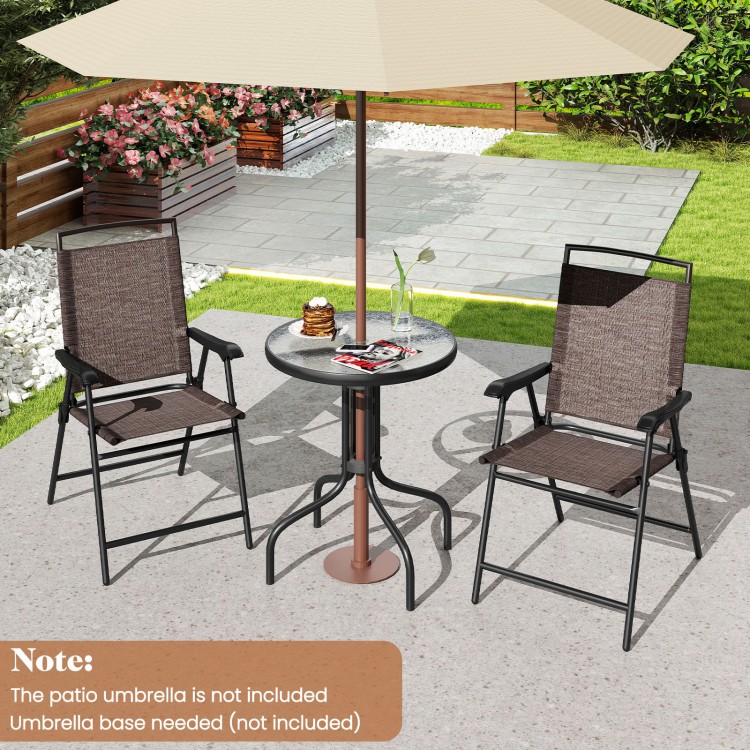 Patio round table with rippled tempered glass and two folding chairs, perfect for outdoor relaxation on porches or.