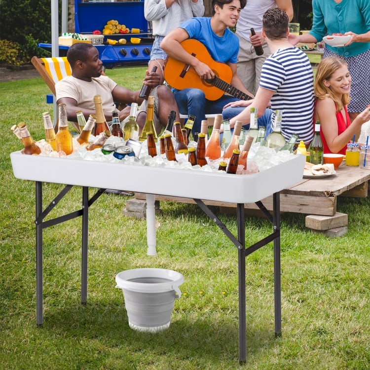 Folding 4 feet plastic party ice table with matching skirt, featuring a drain system, ideal for outdoor gatherings.