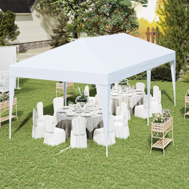10 x 20 ft white pop-up canopy tent set up for a party, featuring a heavy-duty frame and sun-protective fabric.