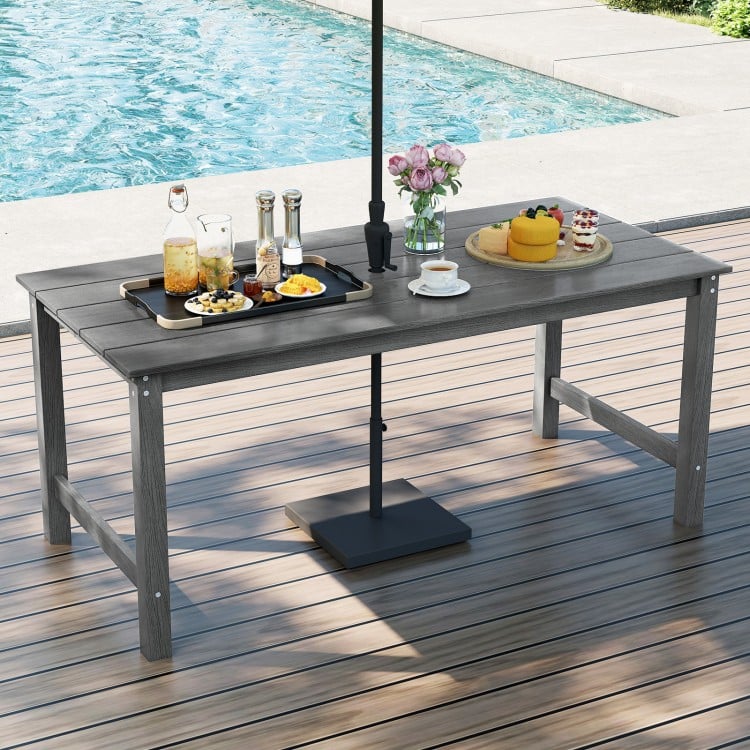 Gray HDPE outdoor dining table for 6 with a wood-like finish, featuring a sturdy design and umbrella hole for outdoor.