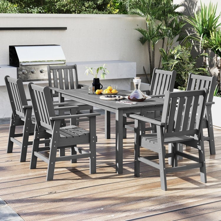 Gray HDPE outdoor dining table with umbrella hole, showcasing a spacious 67" x 32" surface for entertaining family and.
