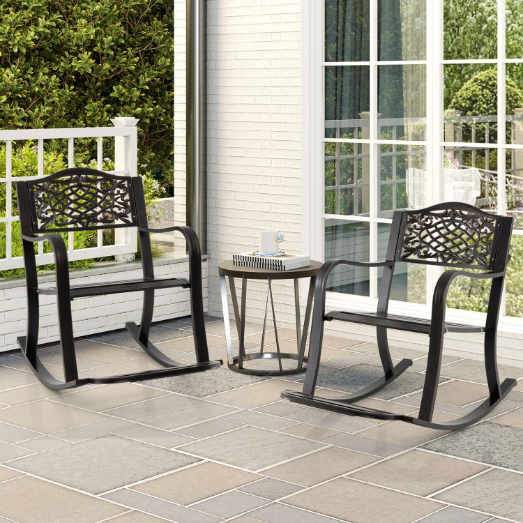 Brown patio rocking chairs with footrest and floral backrest, perfect for backyard relaxation and outdoor comfort.