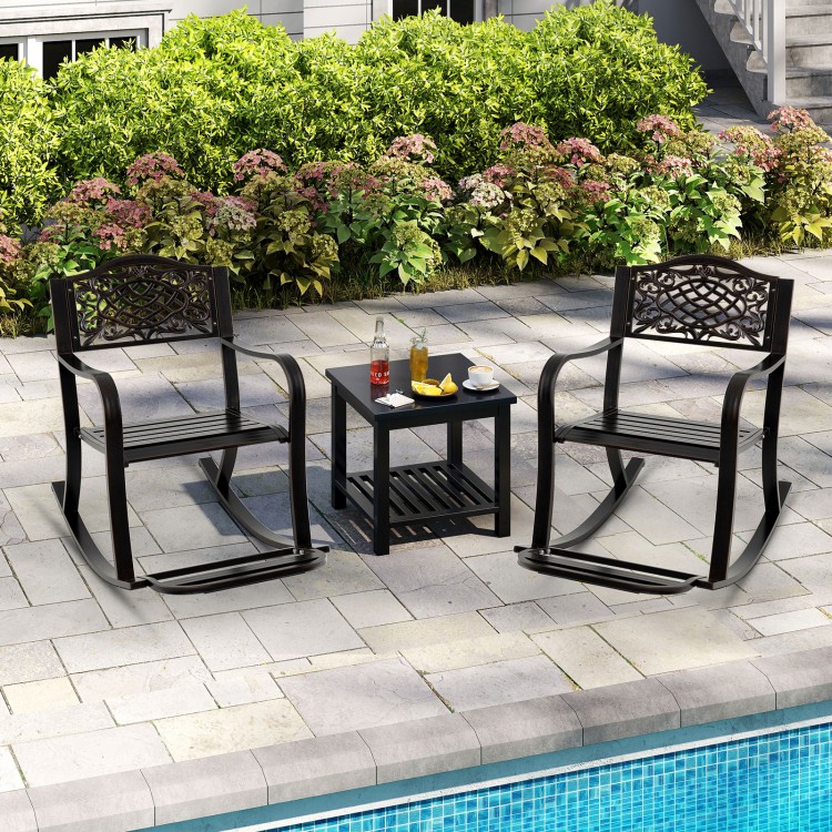 Brown patio rocking chairs with footrests and floral backrest, ideal for backyard relaxation by the poolside.