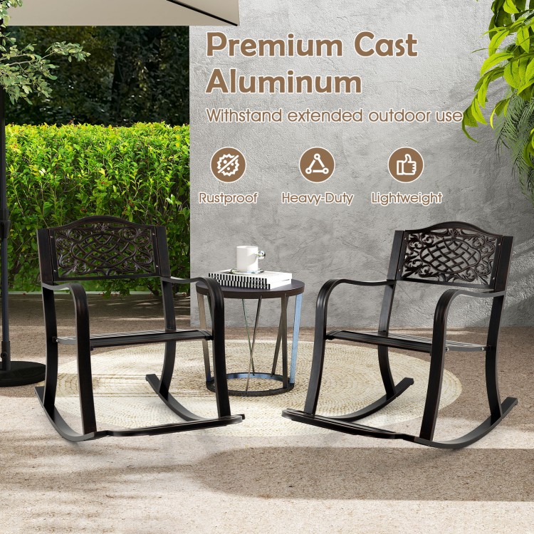 Brown patio rocking chair set made of rustproof cast aluminum with floral backrest, ideal for backyard relaxation.