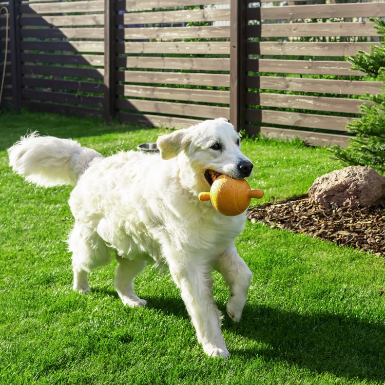 Interlocking artificial grass tiles in a lush green setting, perfect for indoor and outdoor use without maintenance.