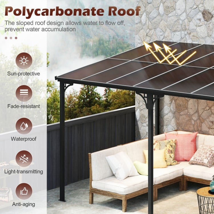 Wall-mounted patio gazebo with sloped polycarbonate roof, black metal frame, designed to prevent water pooling.