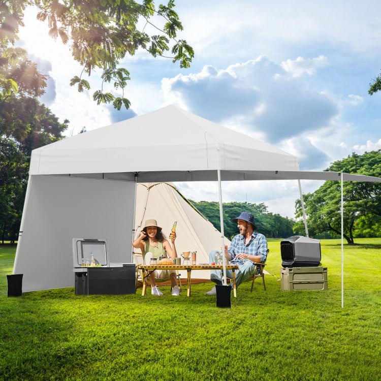 Pop-up canopy tent with two sidewalls for sun protection, ideal for outdoor activities and easy setup in white.
