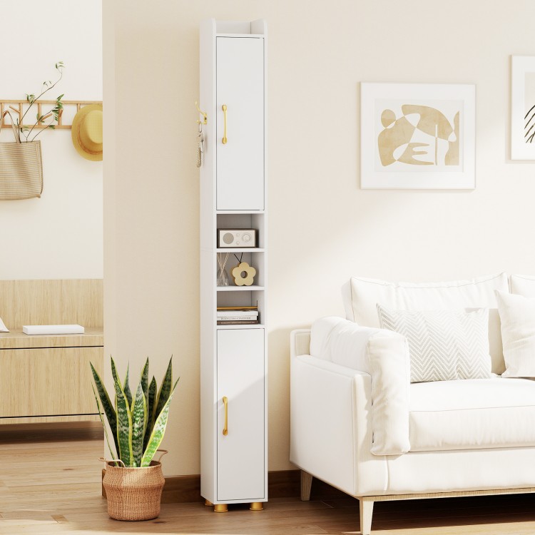 Narrow white bathroom storage cabinet with open shelves, gold handles, and toilet paper holder for efficient space use.
