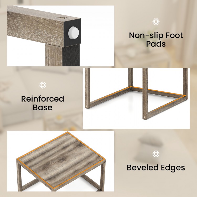 Detail of the reinforced base and non-slip foot pads of the gray nesting coffee table set for versatile arrangement.