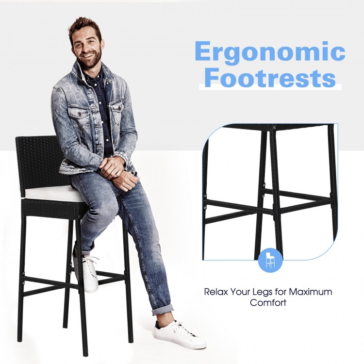 Bar stool with ergonomic footrests and soft padded cushions, designed for comfort and space-saving in outdoor dining.