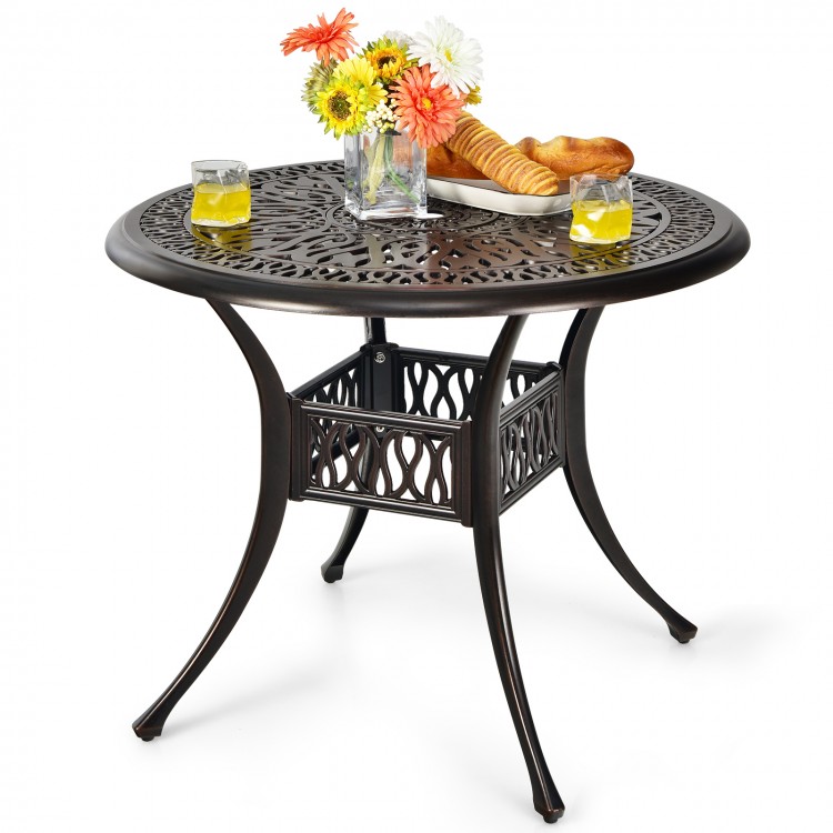 Round 36-inch patio dining bistro table in brown with umbrella hole, featuring elegant patterns for outdoor use.