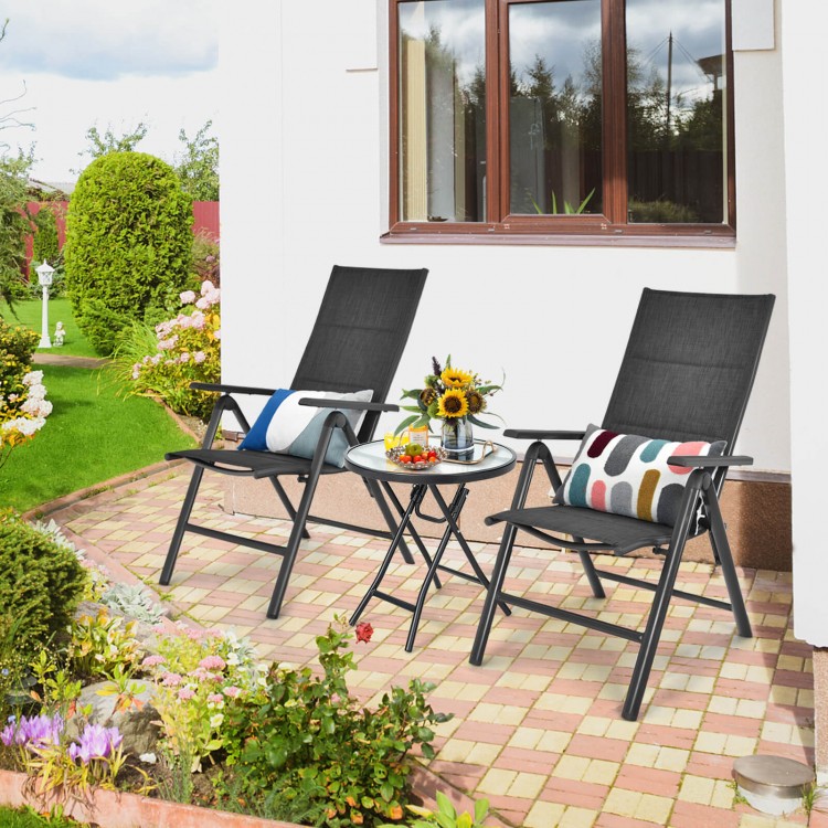 Folding patio side table with tempered glass tabletop, featuring a powder-coated steel frame, ideal for outdoor use.