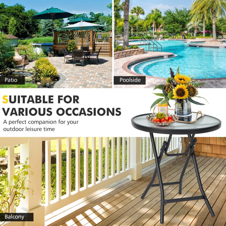 Patio side table with tempered glass tabletop, compact folding design for poolside or backyard leisure activities.