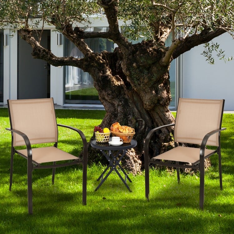 Set of 2 stackable patio dining chairs with armrests in brown, ideal for garden and backyard relaxation.