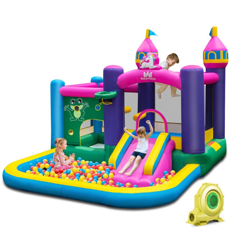 Unicorn-themed inflatable bounce house with slide and ball pit, designed for kids' outdoor fun and safety.