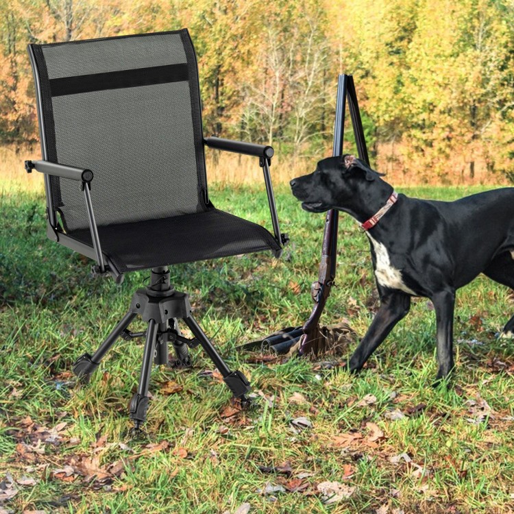 Folding swivel patio chair with adjustable legs, featuring breathable mesh and ergonomic support, set in a grassy.