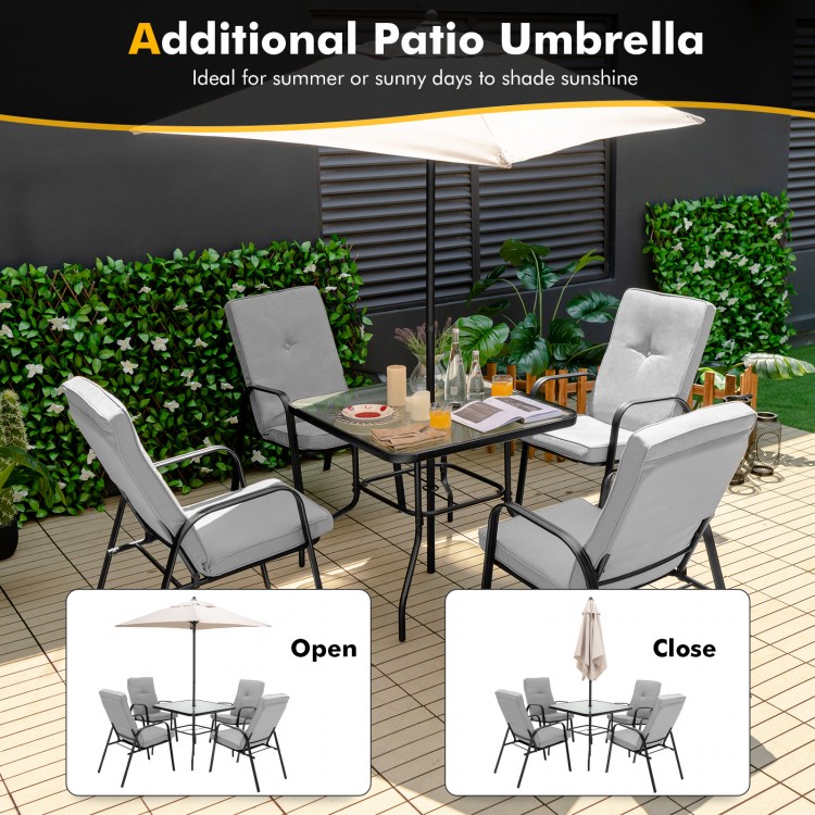 Patio dining set featuring stackable cushioned chairs and an umbrella, ideal for outdoor use in gardens and backyards.