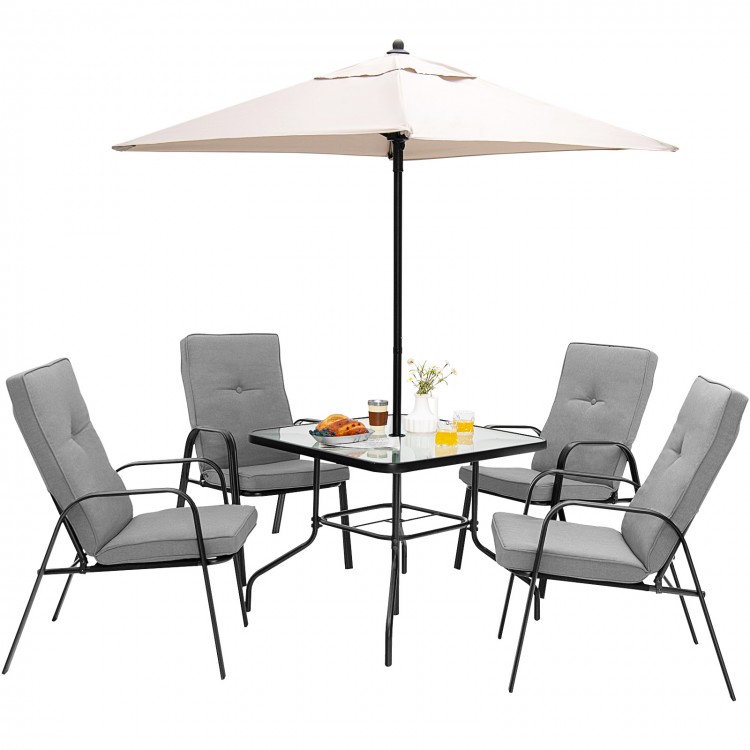 Patio dining set featuring four stackable cushioned chairs and a large umbrella, perfect for outdoor gatherings.