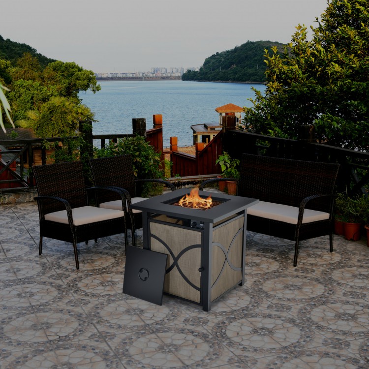 25-inch propane fire pit table with removable lid and fire glass, perfect for outdoor patio gatherings and warmth.